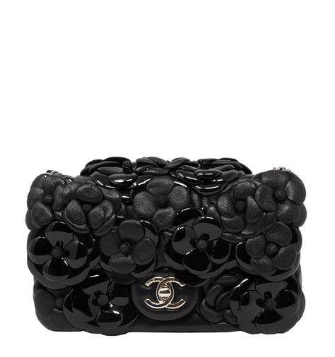 chanel black camellia flap bag